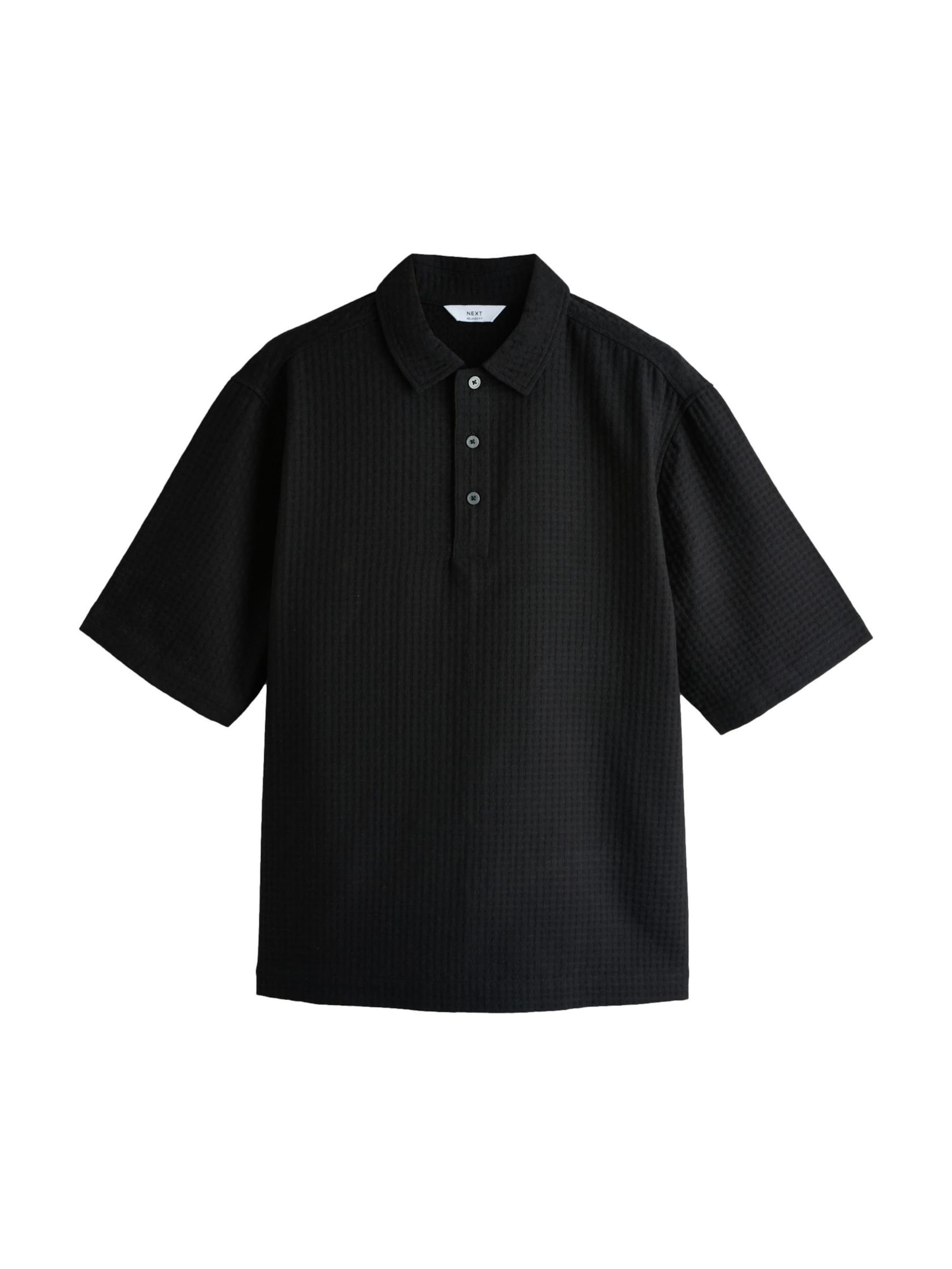 Next Poloshirt in Schwarz: Vorderseite