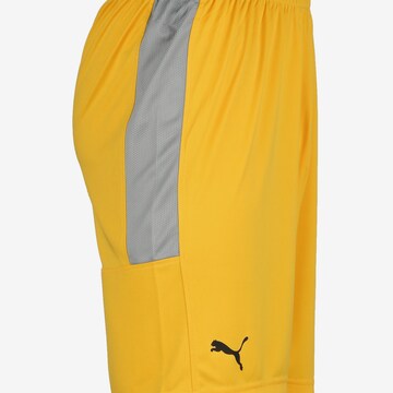 PUMA Loose fit Workout Pants in Yellow