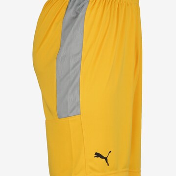 Loosefit Pantalon de sport PUMA en jaune