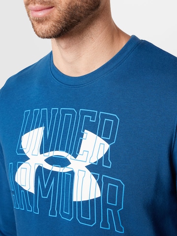 UNDER ARMOUR - Sweatshirt de desporto em azul