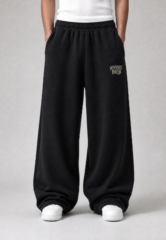 Vertere Berlin Loose fit Trousers in Black: front