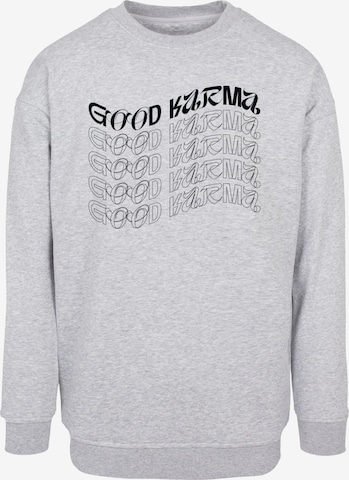 Merchcode Sweatshirt 'Good Karma' in Grey: front