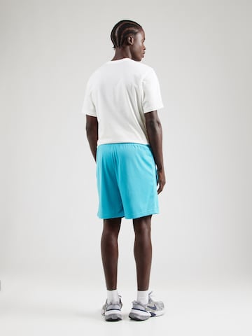 Nike Sportswear Szabványos Nadrág - kék