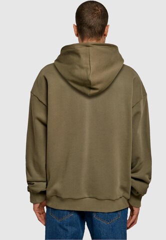 Merchcode Sweatshirt 'Peanuts - If You Like It Wear It' in Groen