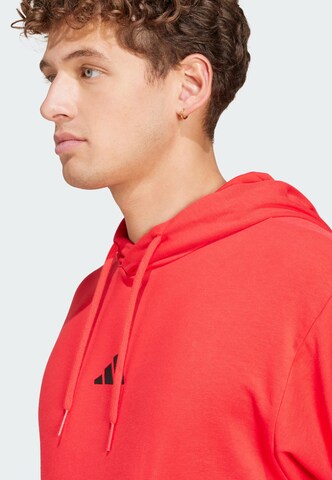 ADIDAS SPORTSWEAR Sportsweatshirt 'Essentials Feelcozy' in Rot