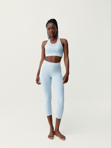 Born Living Yoga Skinny Sporthose 'Daya' in Blau