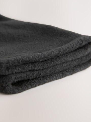 Gants Next en noir