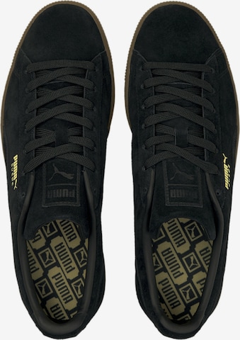 Baskets basses PUMA en noir