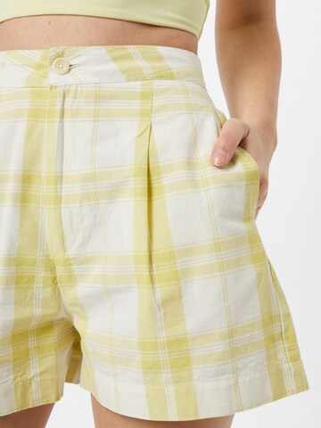 Thinking MU Zvonové kalhoty Kalhoty se sklady v pase – žlutá