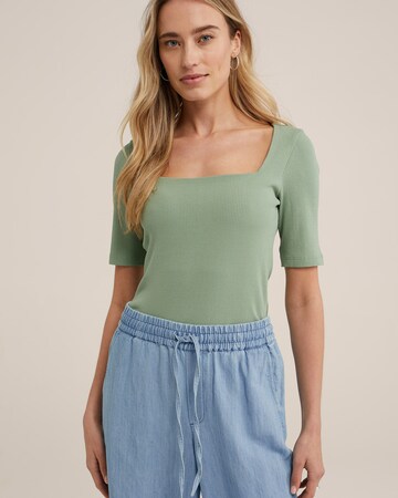 T-shirt WE Fashion en vert : devant