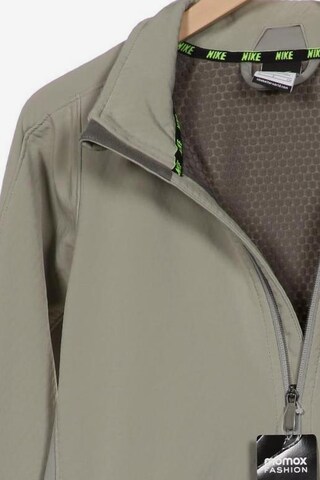 NIKE Jacket & Coat in S in Grey