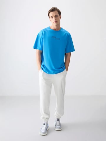 Tommy Life T-Shirts in Blau