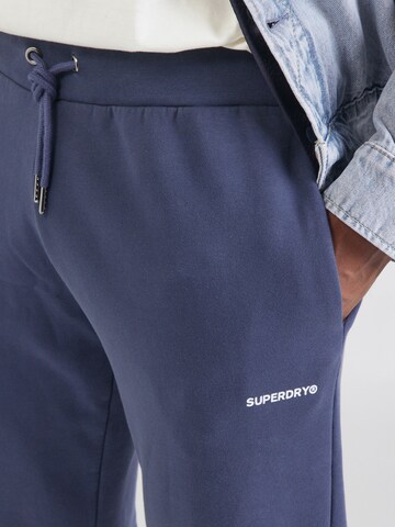 Effilé Pantalon Superdry en bleu