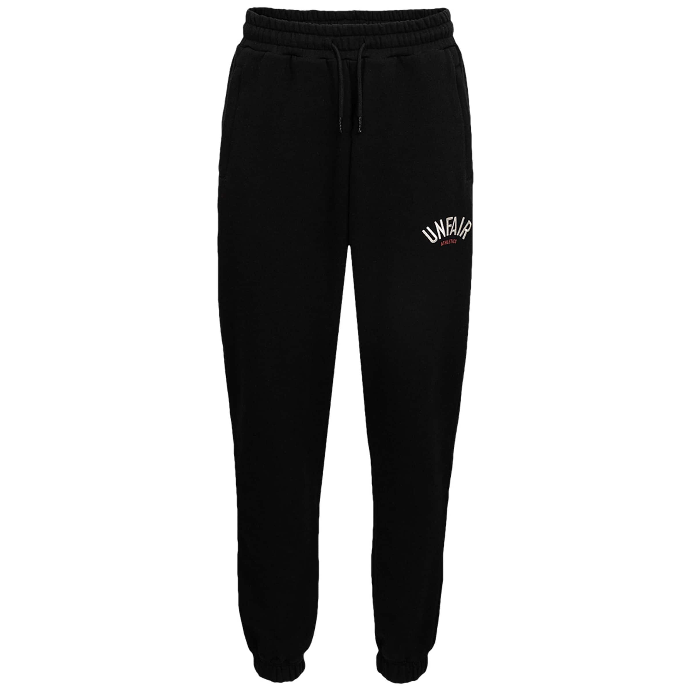 Unfair Athletics Tapered Trousers in Black: front