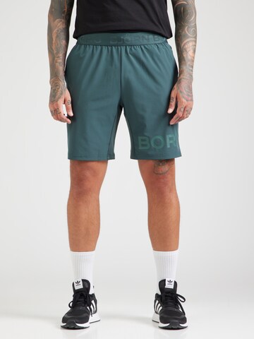 BJÖRN BORG - Regular Calças de desporto em verde: frente
