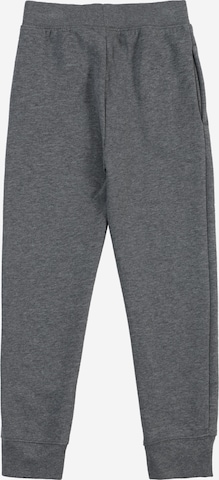 Nike Sportswear Tapered Housut 'CLUB FLEECE' värissä harmaa