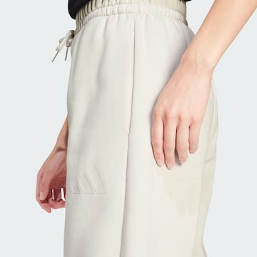 ADIDAS SPORTSWEAR - Loosefit Pantalón deportivo 'Essentials' en gris