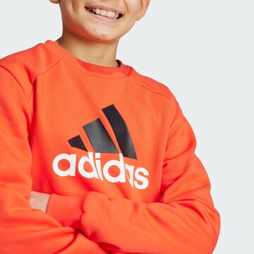ADIDAS SPORTSWEAR Trainingsanzug 'Essentials' in Rot