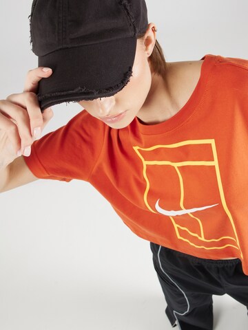 NIKE - Camiseta funcional 'HERITAGE' en naranja