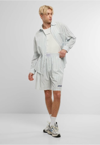 Another Cotton Lab - Loosefit Pantalón en azul