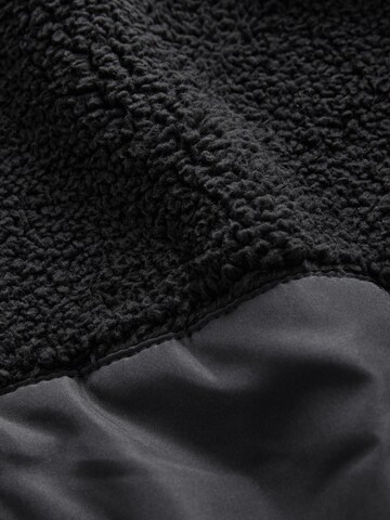 Gilet Next en noir