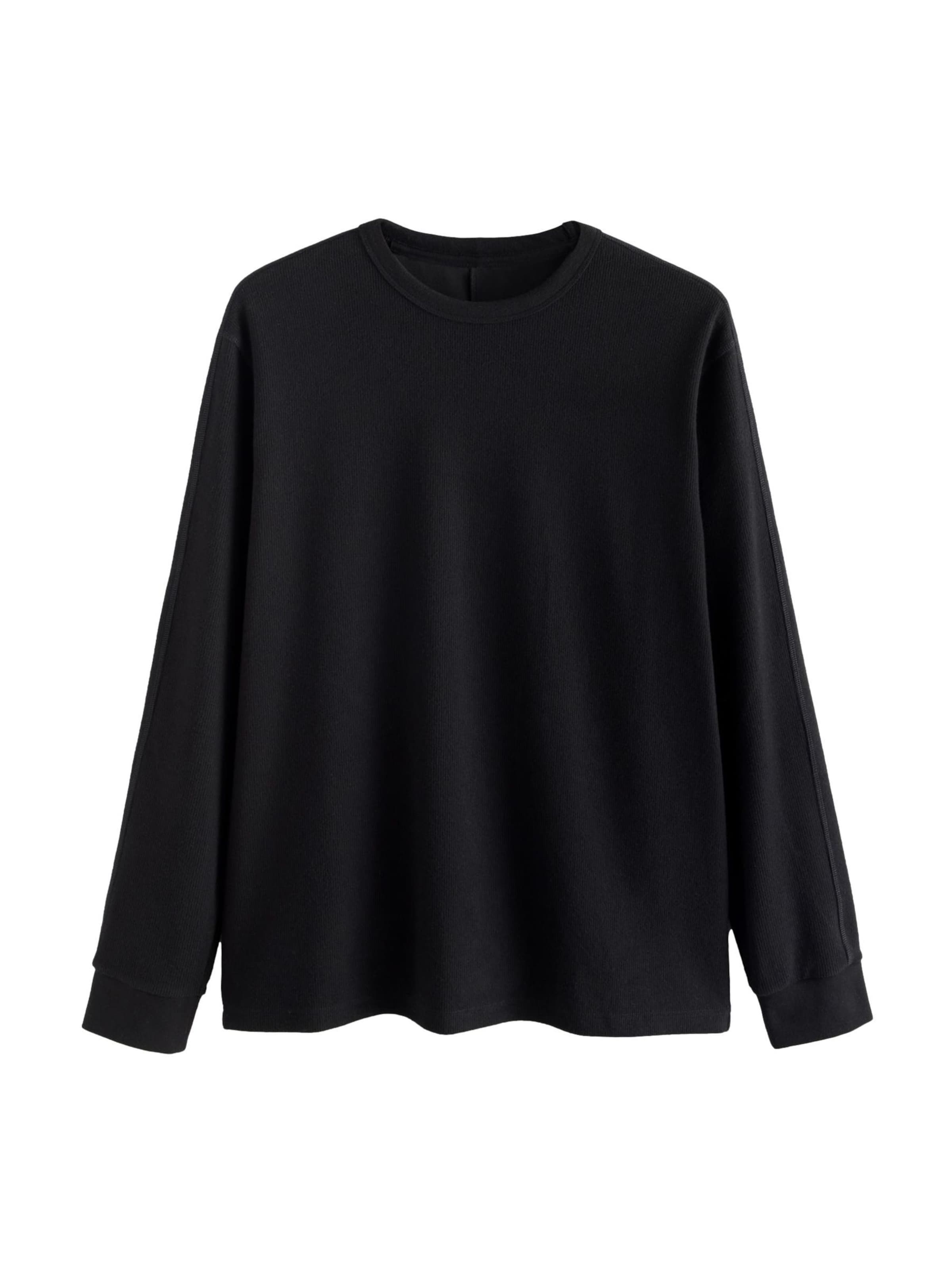 Next T-shirt i svart: framsida