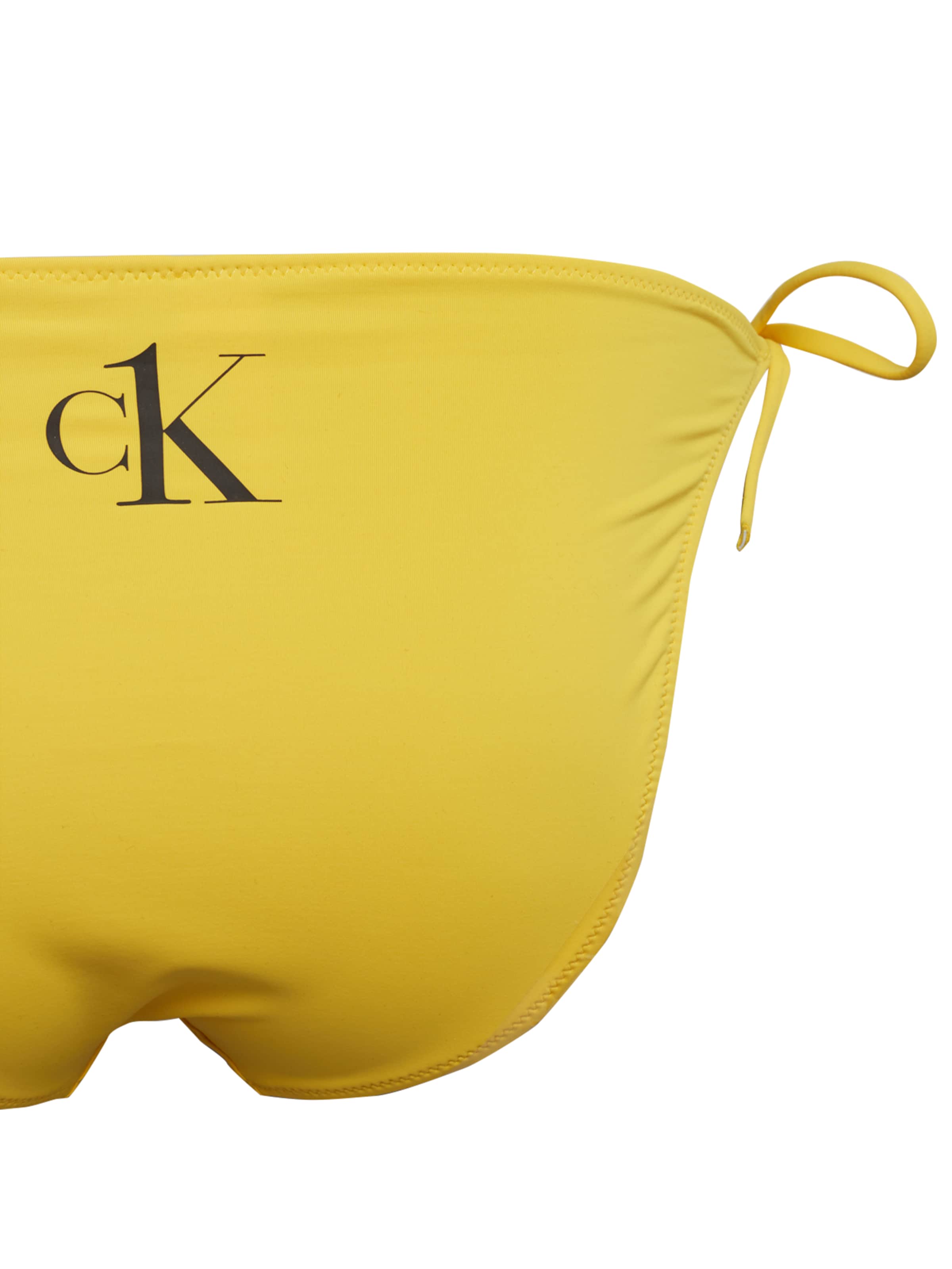 Slip bikini di Calvin Klein Swimwear Plus in giallo