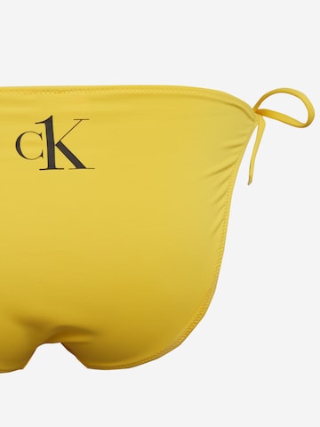 Calvin Klein Swimwear Plus Spodní díl plavek – žlutá