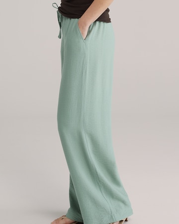 žalia WE Fashion Plačios klešnės Kelnės