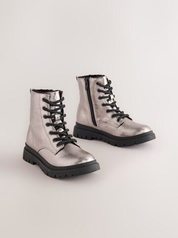 Bottes Next en argent