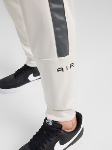 Nike Sportswear Regular Функционален панталон 'AIR' в бежово