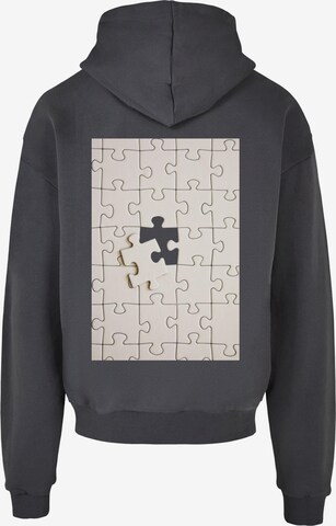 Merchcode Sweatshirt 'Missing Piece' in Grijs