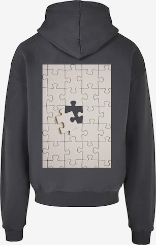 Merchcode Sweatshirt 'Missing Piece' in Grey