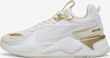 Baskets basses PUMA en blanc : devant