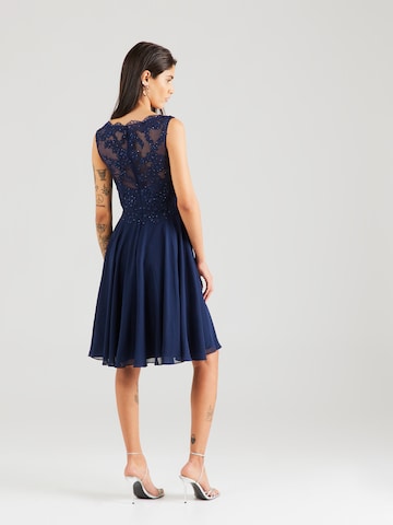 Rochie de cocktail de la mascara pe albastru