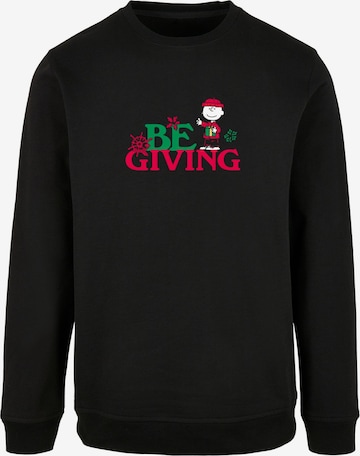 Merchcode Sweatshirt 'Peanuts Be Giving' in Black: front