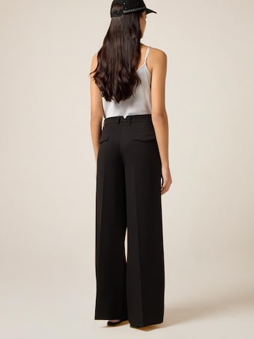 oltre Baggy Trousers in Black
