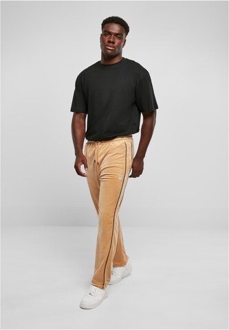 Regular Pantalon Karl Kani en beige