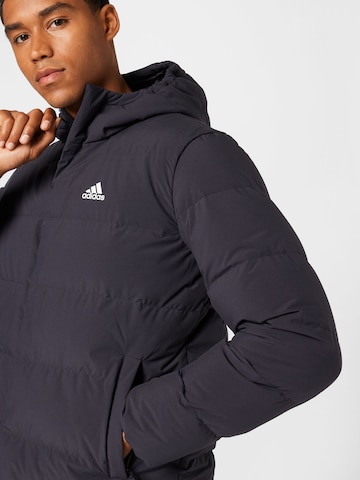 ADIDAS SPORTSWEAR Outdoorjas 'Helionic' in Zwart