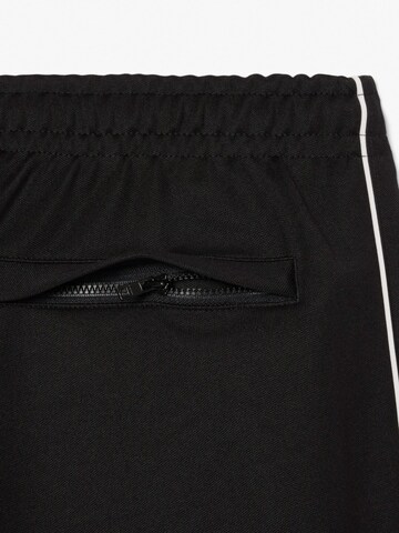 regular Pantaloni funzionali 'Paris' di LACOSTE in nero