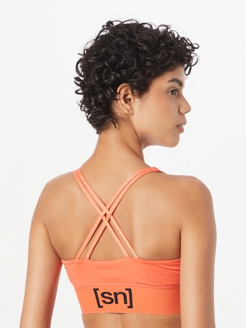 super.natural Bralette Sports Bra in Orange