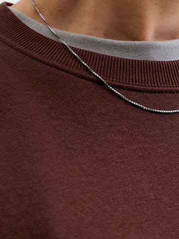 Sweat-shirt 'JJEACE' JACK & JONES en marron