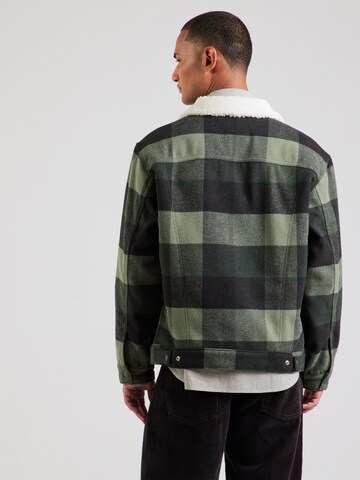LEVI'S ® Prechodná bunda 'Relaxed Fit Plaid Sherpa Trucker Jacket' - Zelená