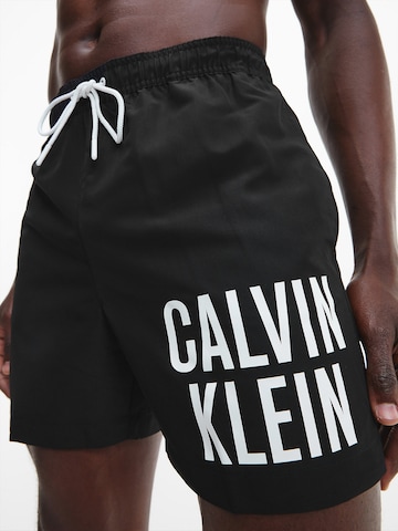 Calvin Klein Swimwear شورت سباحة بلون أسود