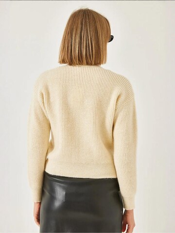 Cardigan Bianco Lucci en beige