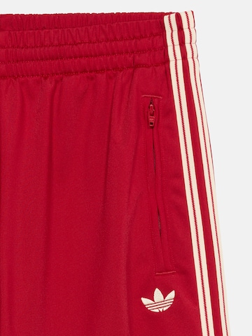 ADIDAS ORIGINALS Свободный крой Штаны 'FIREBIRD TP' в Красный