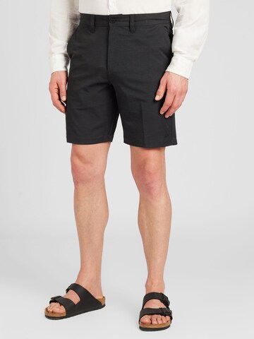 RVCA Regular Chino Pants in Black: front