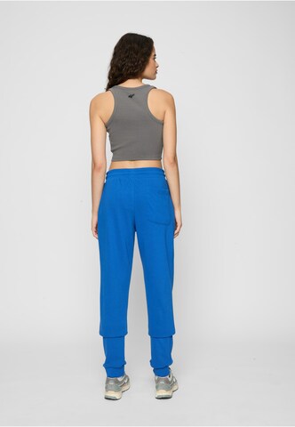 Tapered Pantaloni di Urban Classics in blu