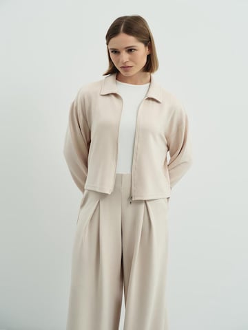 C&City Wide leg Pleat-front trousers in Beige