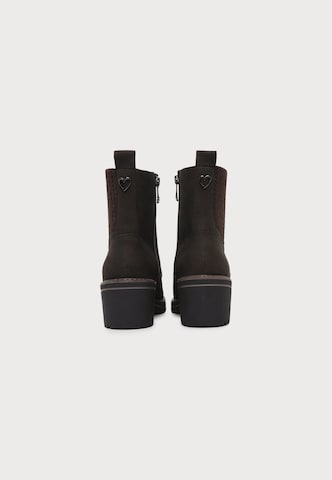 MARCO TOZZI - Botines con cordones en marrón